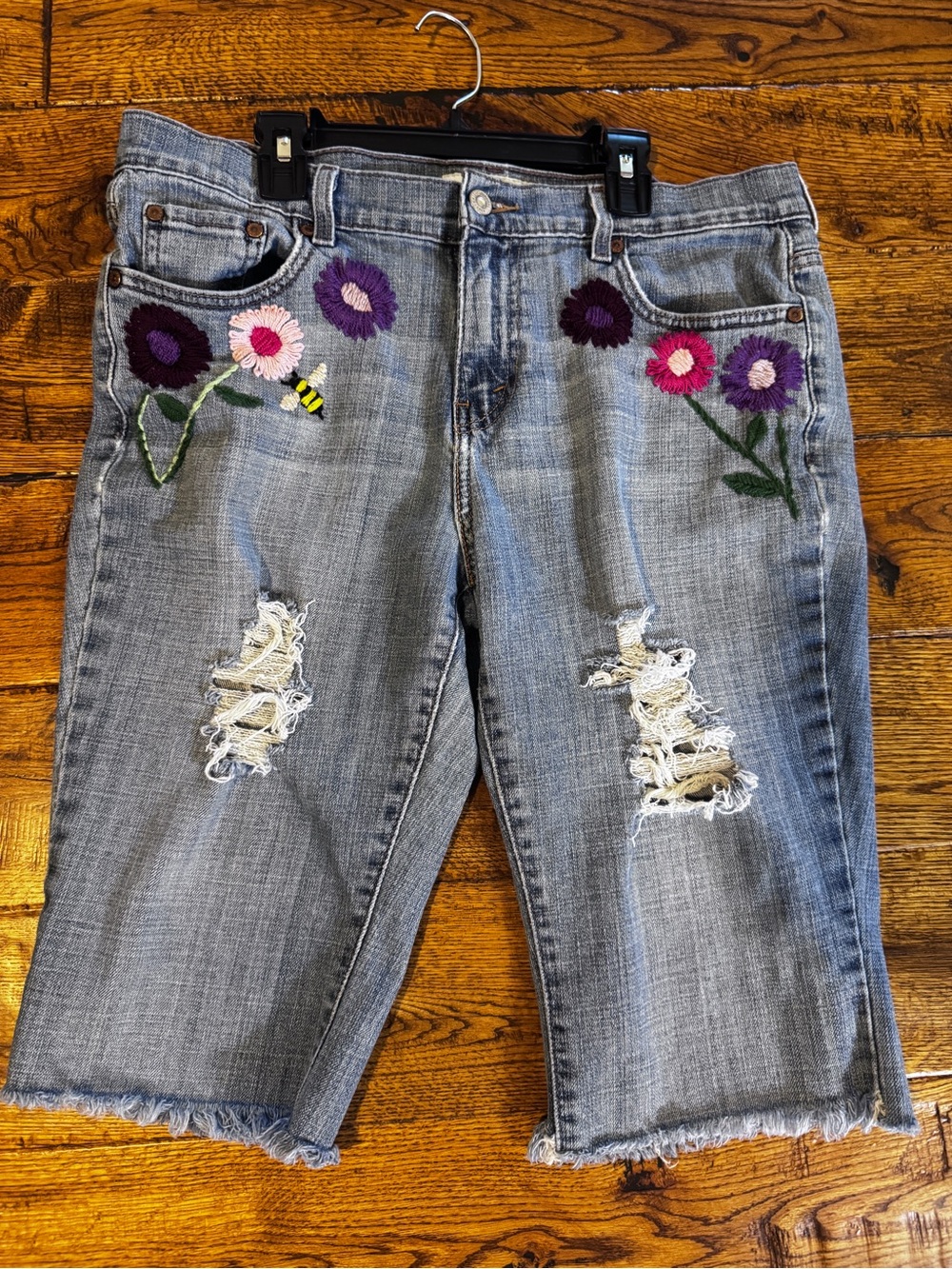 Levi's Boot Cut Off Jean Shorts - Light Blue Denim with floral accents